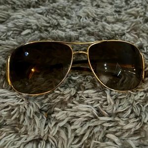 Cool gold and black Prada sunglasses- fair condition